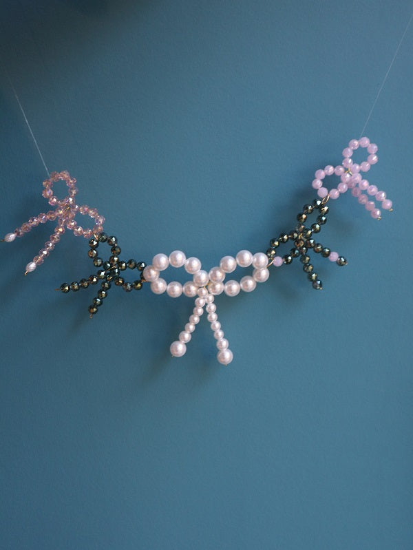 Design julesløjfer med perler