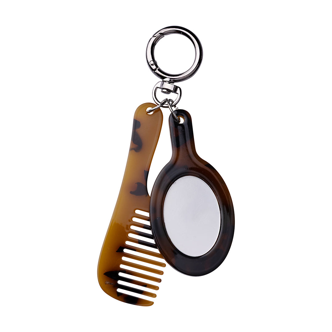 Sæt med kam og lommespejl, nøglering